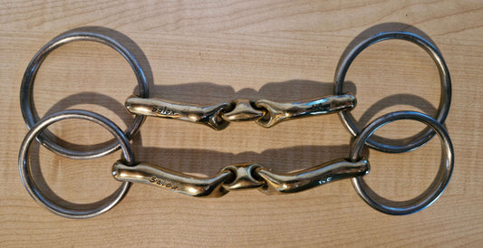 Used Neue Schule Verbindend bit with 4.5" loose ring and 5" bradoon, in good condition, ideal for horse riding.